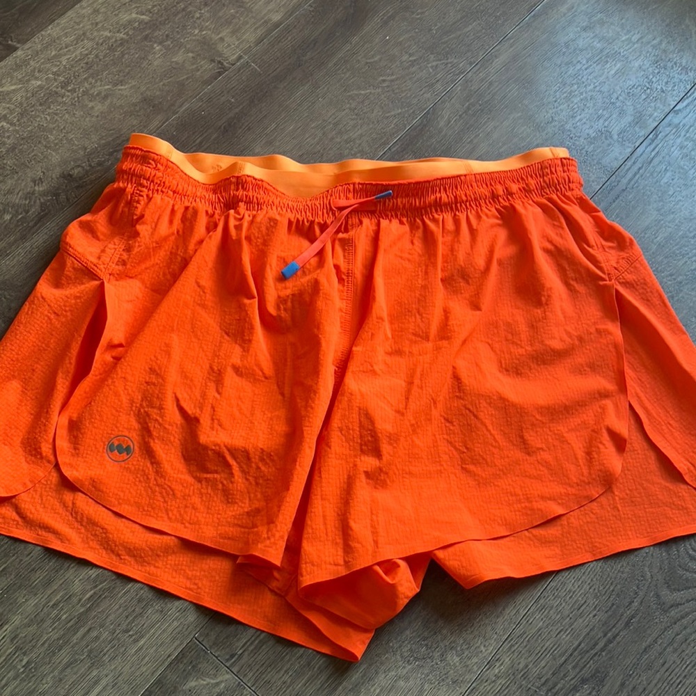 Janji Women's Athletic Shorts in Bright Orange